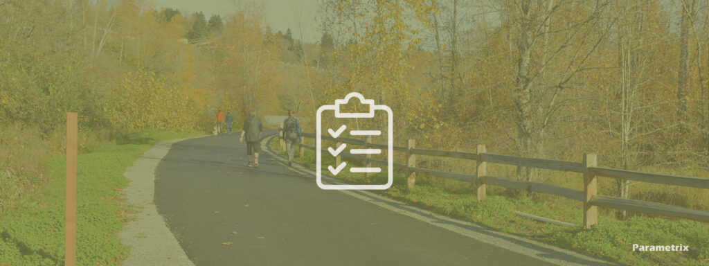 A trail with people walking and a checklist icon overlay