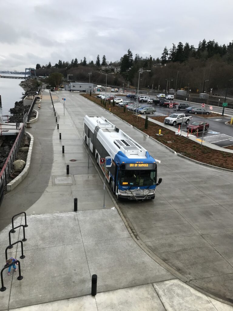 a bird's eye view as a bus pulls in to the transit center