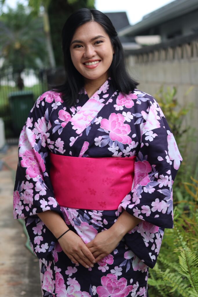 Rachel wearing a pink and blue floral Japanese Yukata