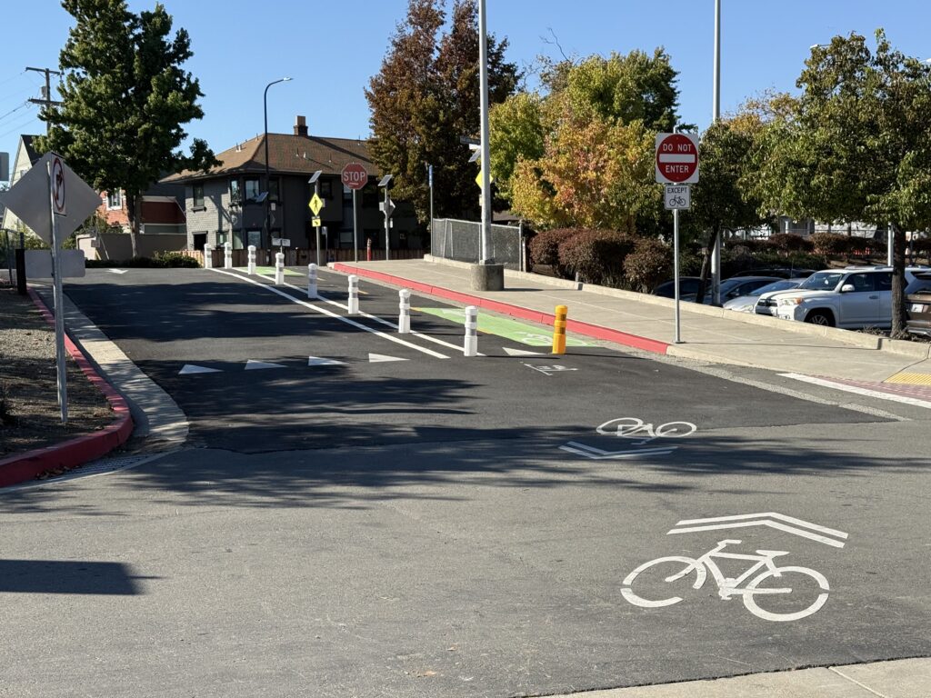 A separated bike lane going up a hill