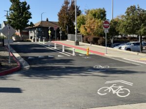 A separated bike lane going up a hill