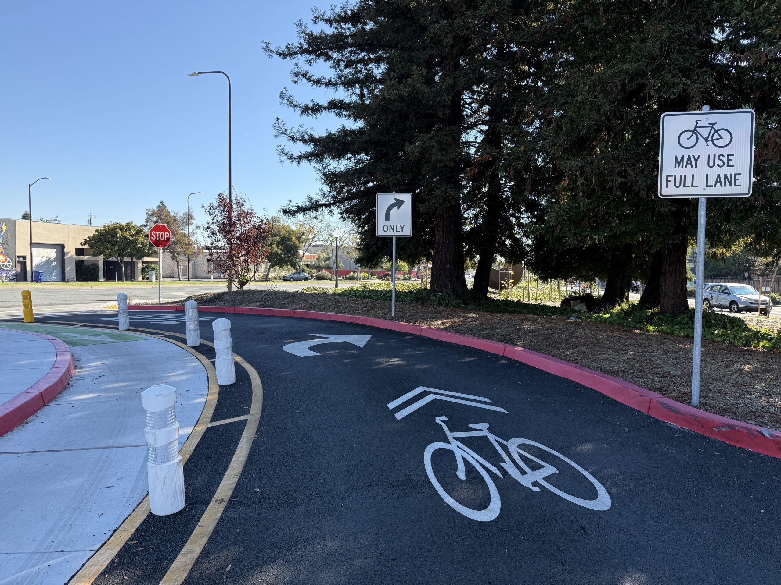 A bike lane marked with a bicycle icon