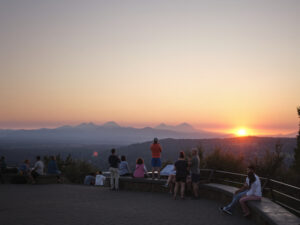 People overlook a sunset