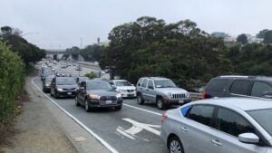 Cars line up on a freeway off ramp
