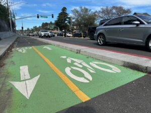 A green bike lane with an arrow